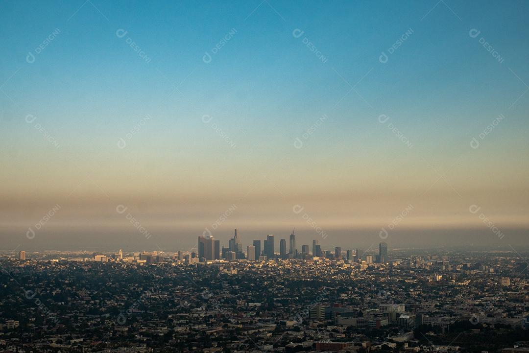 Wide view of Los Angeles city with polluted sky.