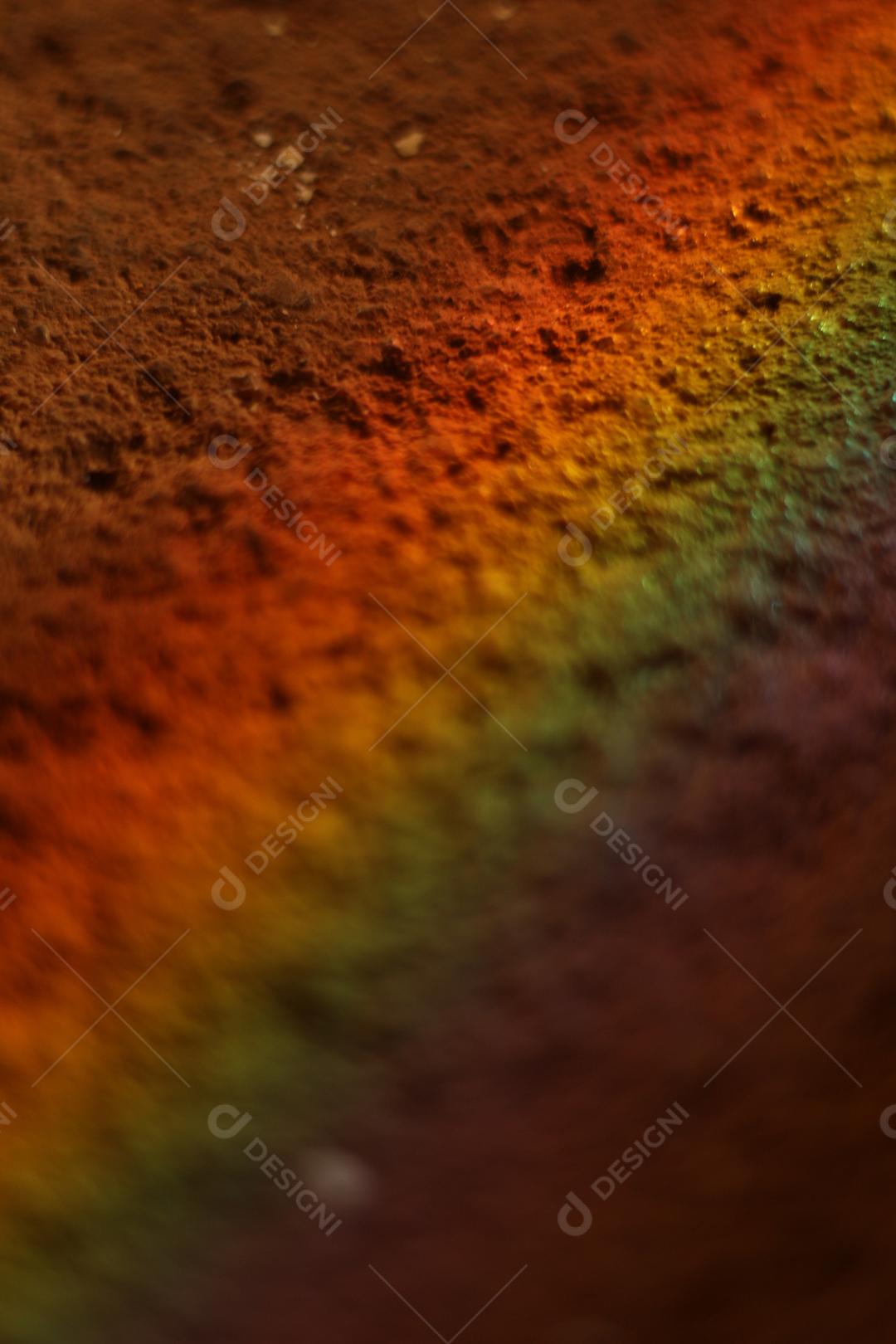 Reflexo arco-íris em areia