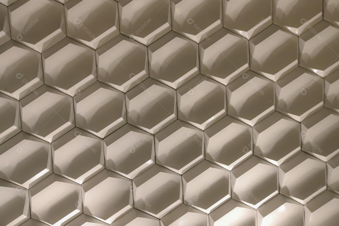 Superfície cinza de textura de parede hexagonal.