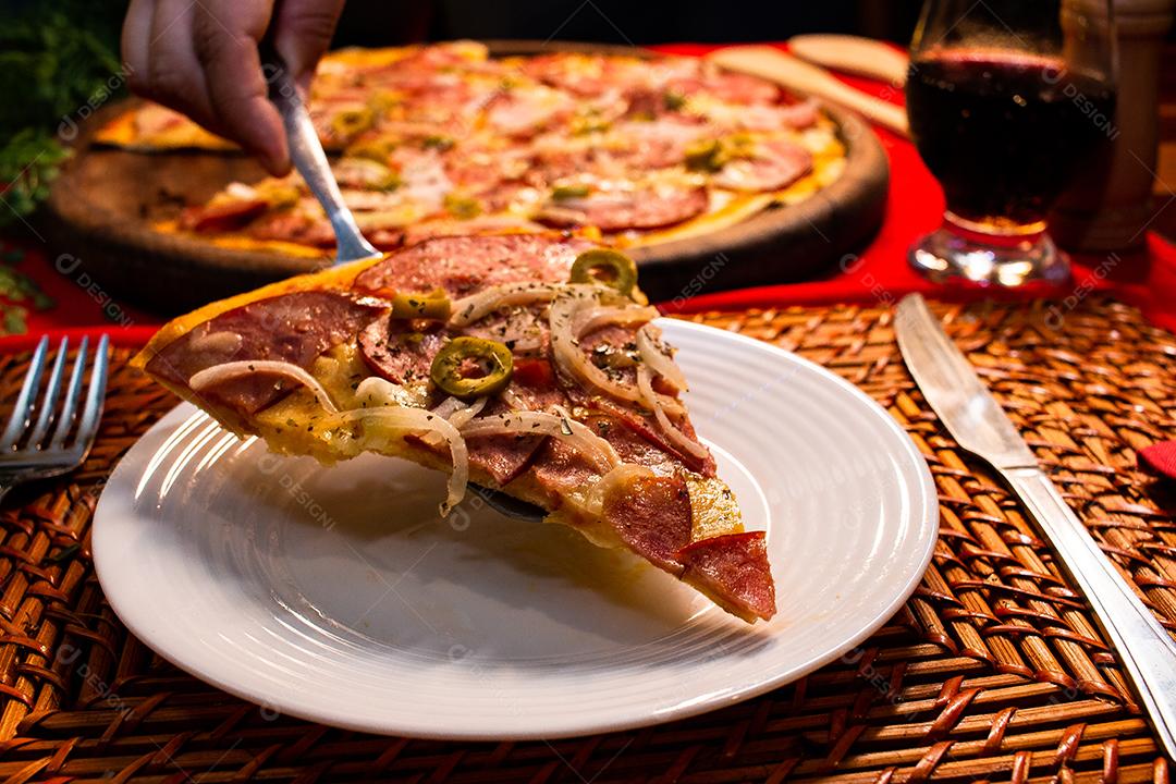 Pepperoni Pizza with Onions on Porcelain Plates