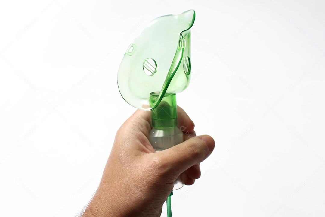 Person's hands holding Venturi mask