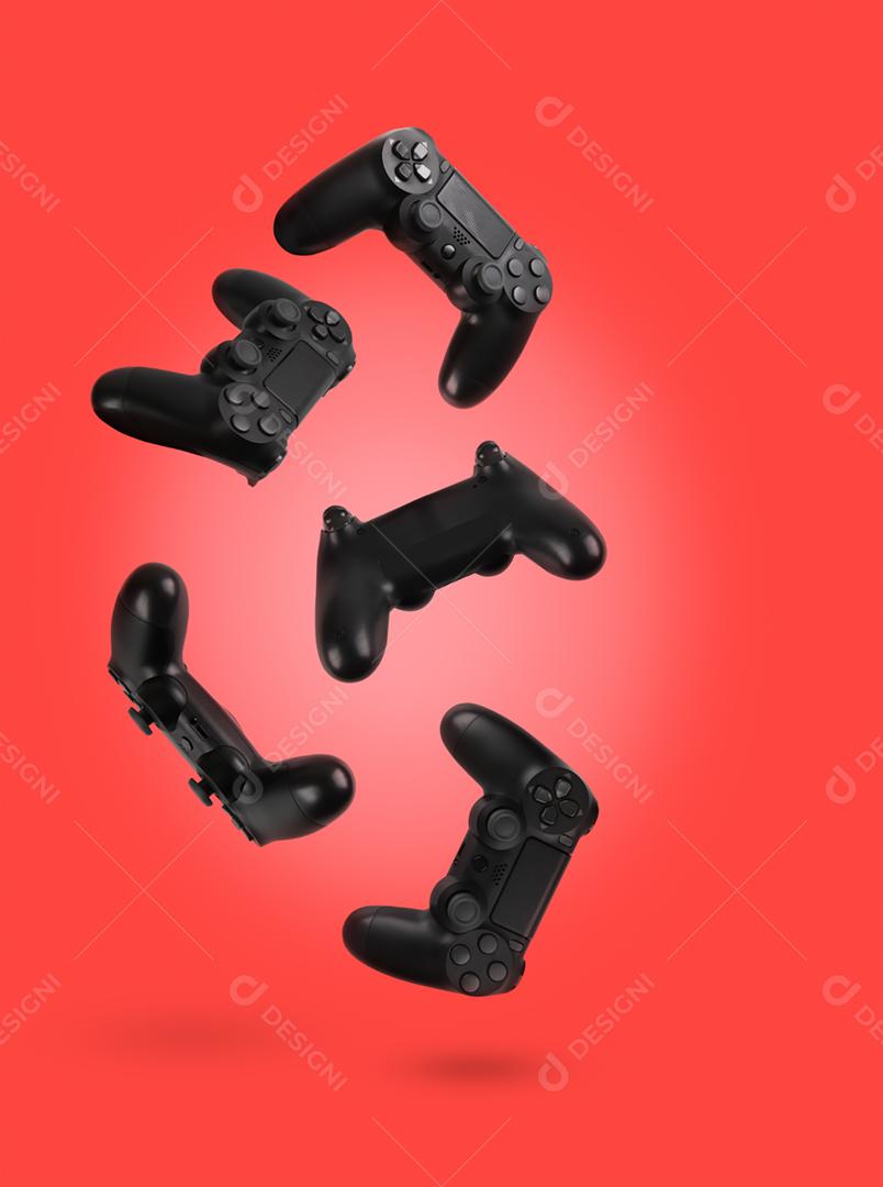 controladores de videogame isolados em um fundo de cor vermelha