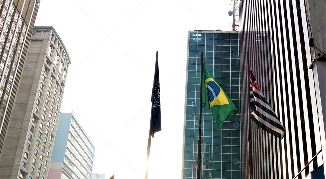 Flags of parents flying over high buildings