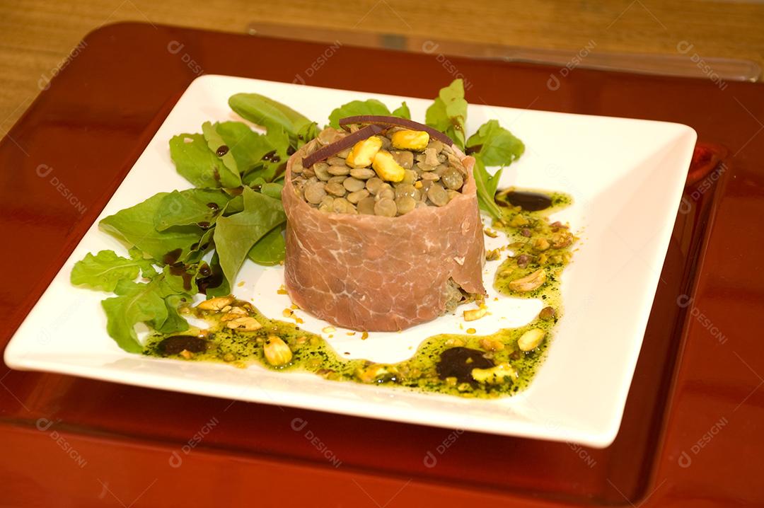 Plate of food on a wooden table