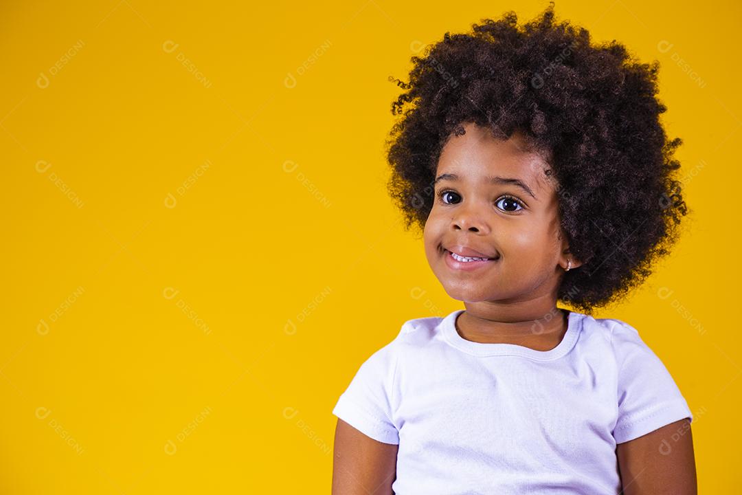 Beauty portrait of afro girl with afro hairstyle. Adorable girl with blackpower hair