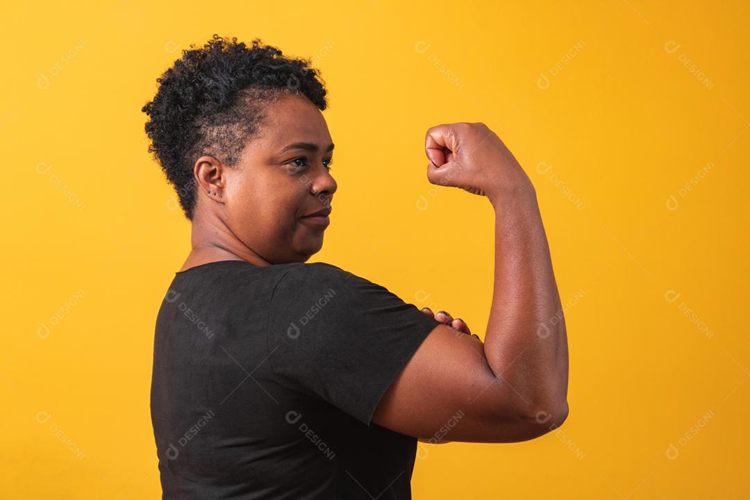 We can do it. The female fist of female power. Woman victim of racism