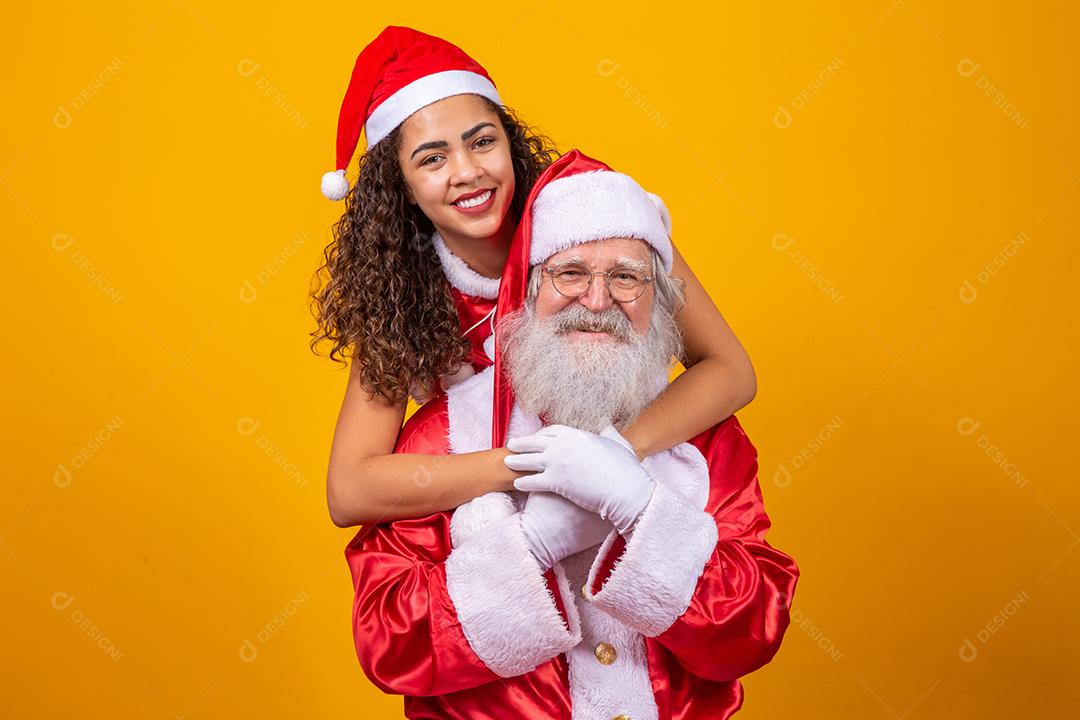 Papai Noel e noelete em clima de feliz natal. Feliz Natal