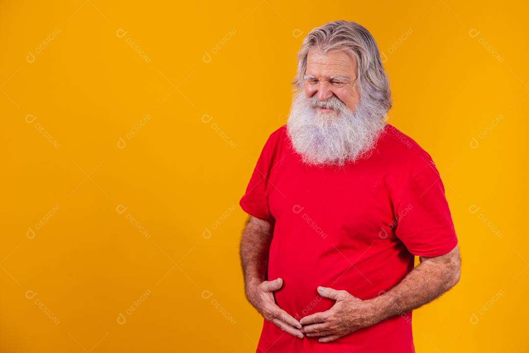 Elderly man is suffering from digestion and stomach problems