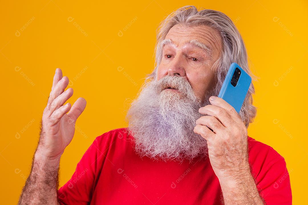 cheerful elderly man talking on the phone