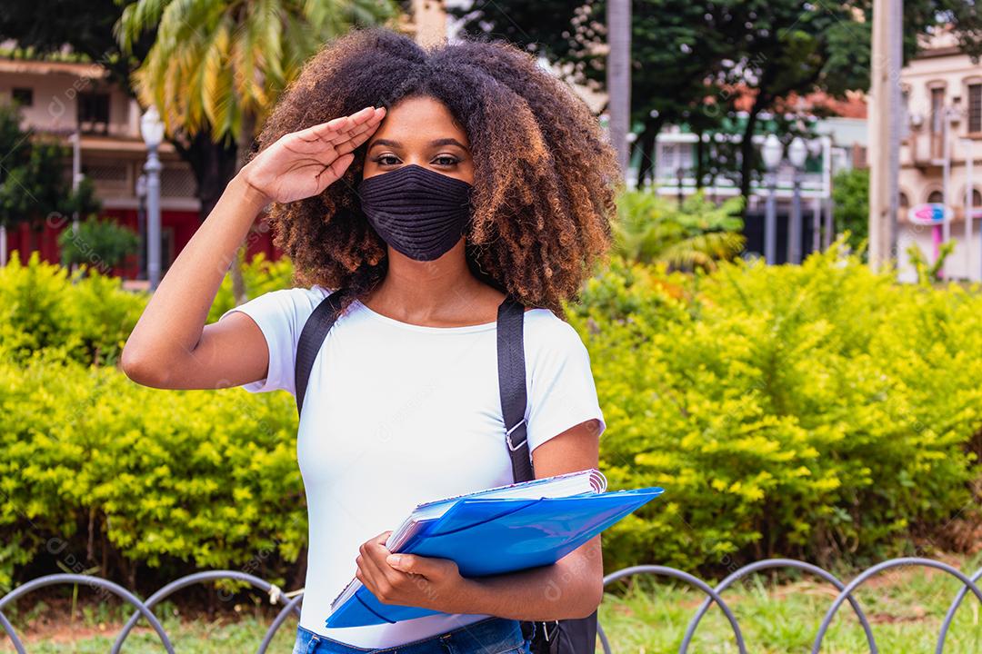 Young African American student wearing coronavirus safety mask