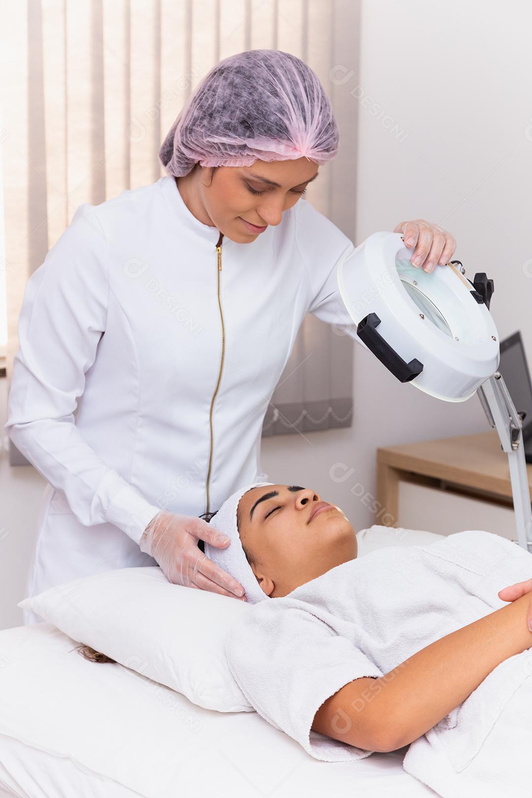Woman getting massage treatment in beauty salon
