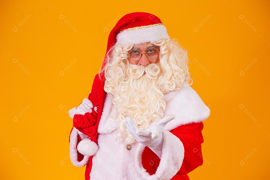 Santa Claus on yellow background.