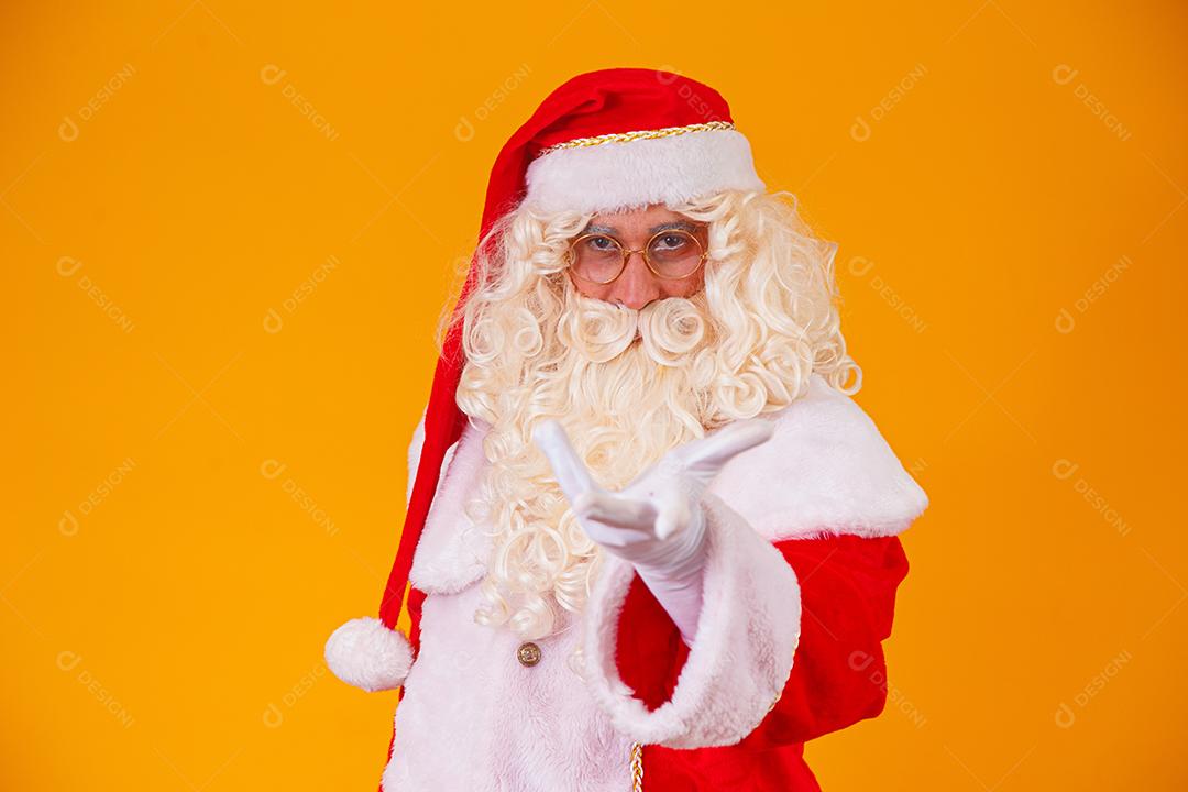 Santa Claus on yellow background.
