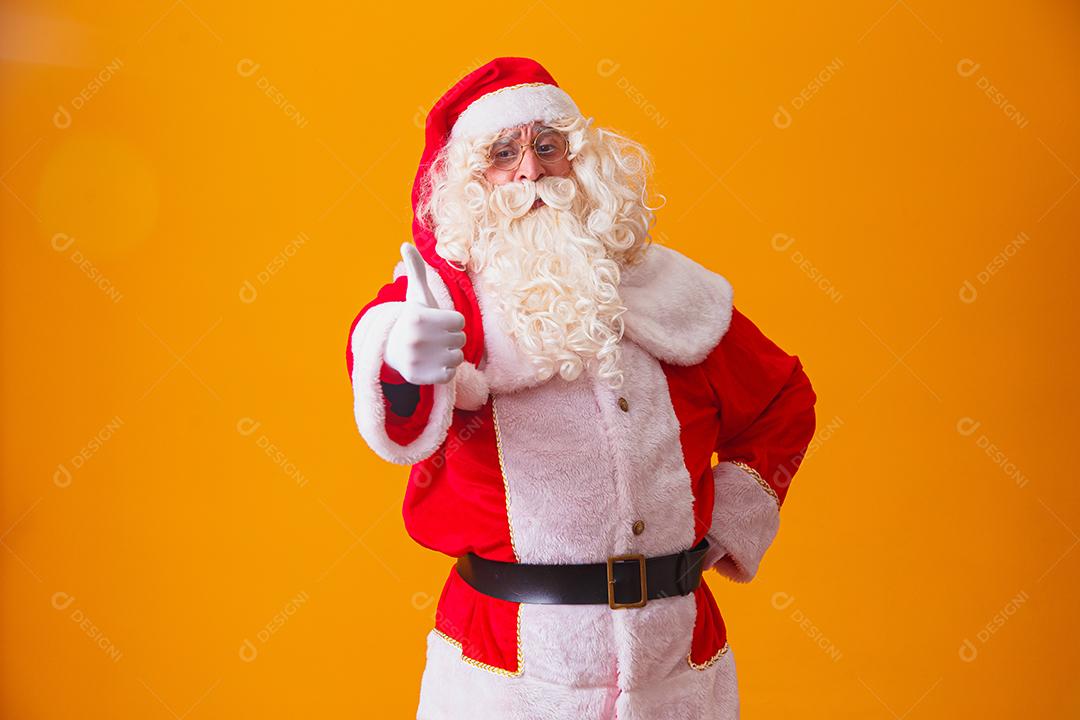 Santa Claus on yellow background.