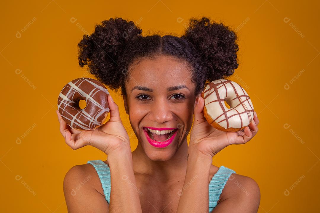 Beautiful Afro Young Woman with Donuts