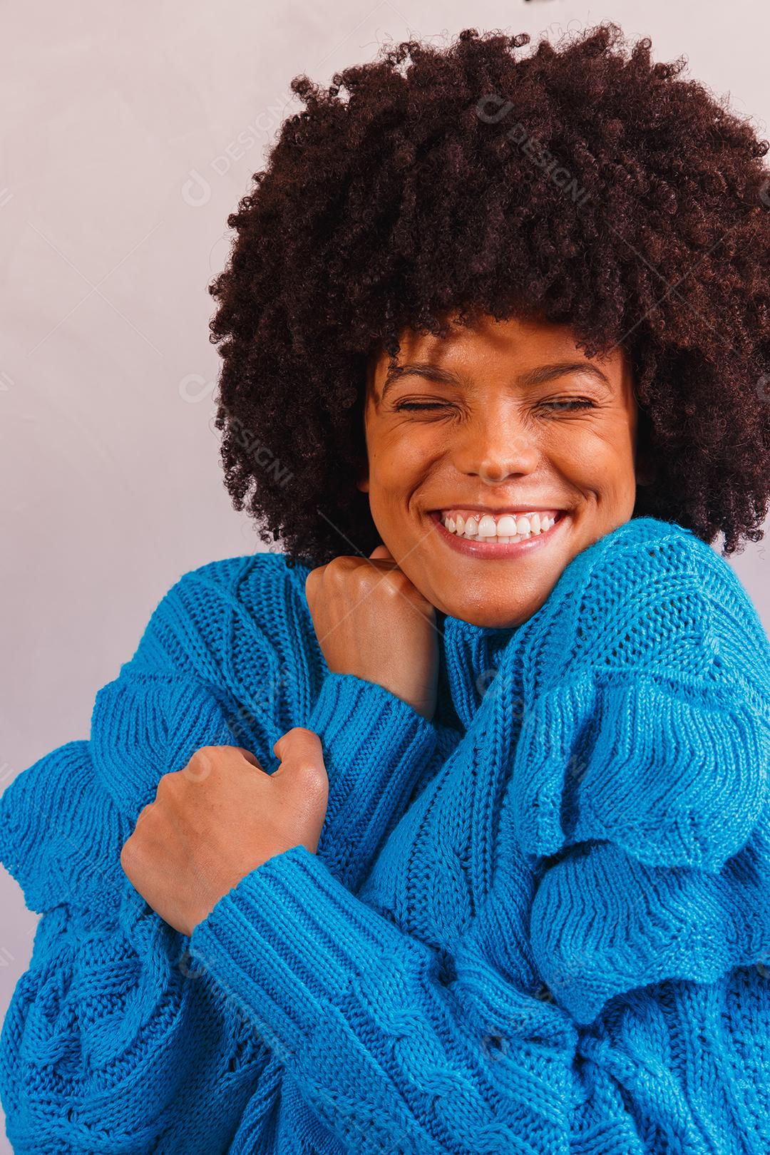 afro woman dressed for winter