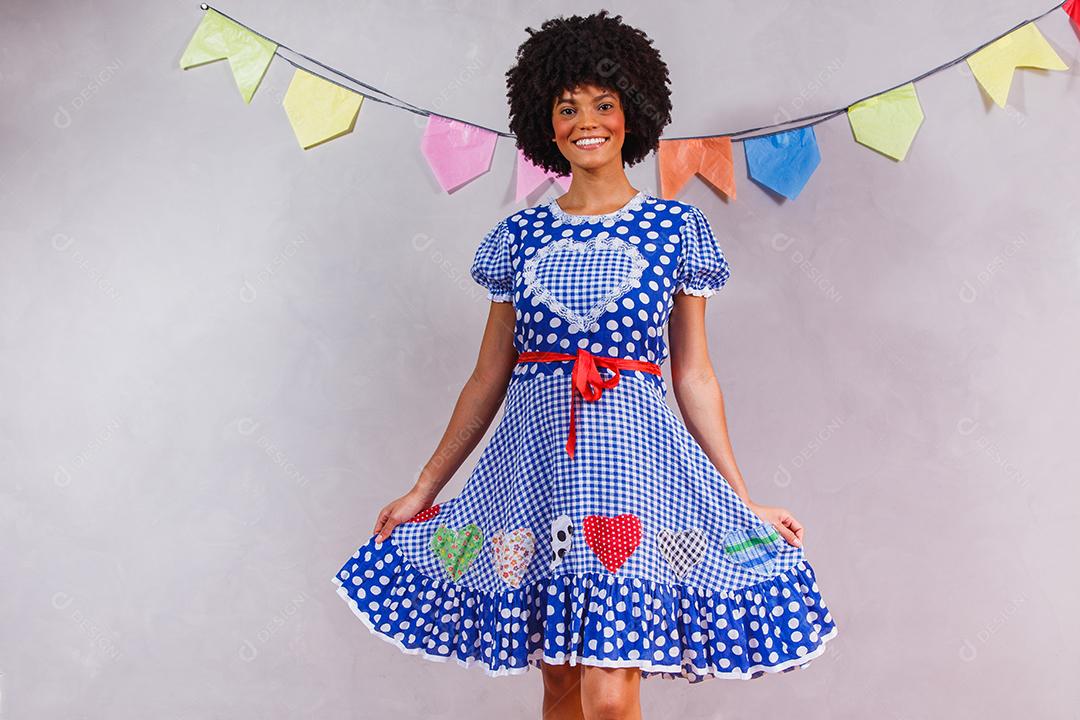 Afro Brazilian woman wearing typical clothes for the Festa Junina
