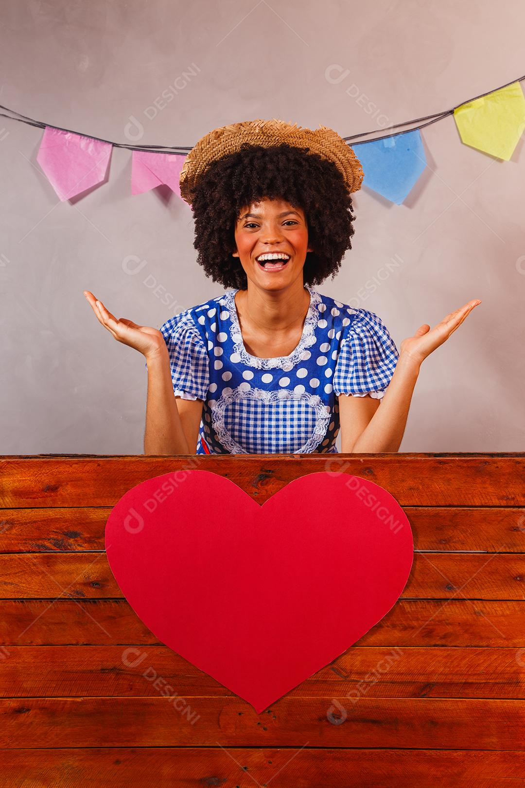 jovem afro vestida para festa junina