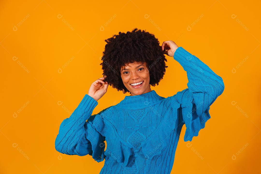 afro woman dressed for winter
