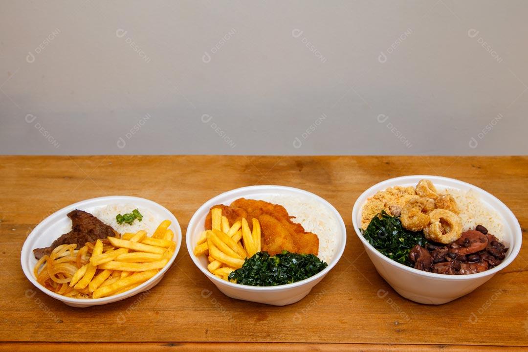 Diferentes marmitex deliciosos Marmitas Sobre a Mesa Comidas Diferenciadas