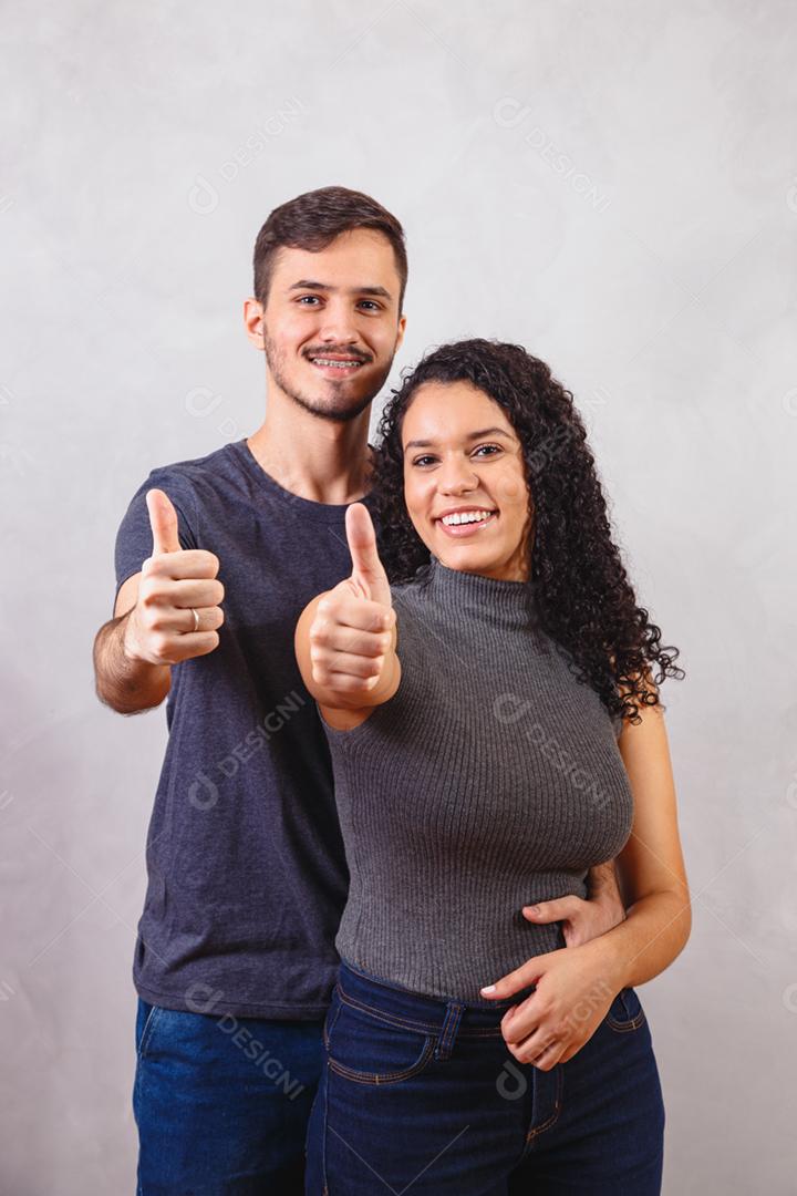 happy valentine couple on gray background