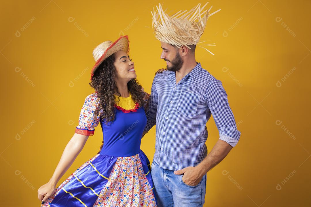 Brazilian couple wearing traditional clothes for Festa Junina -