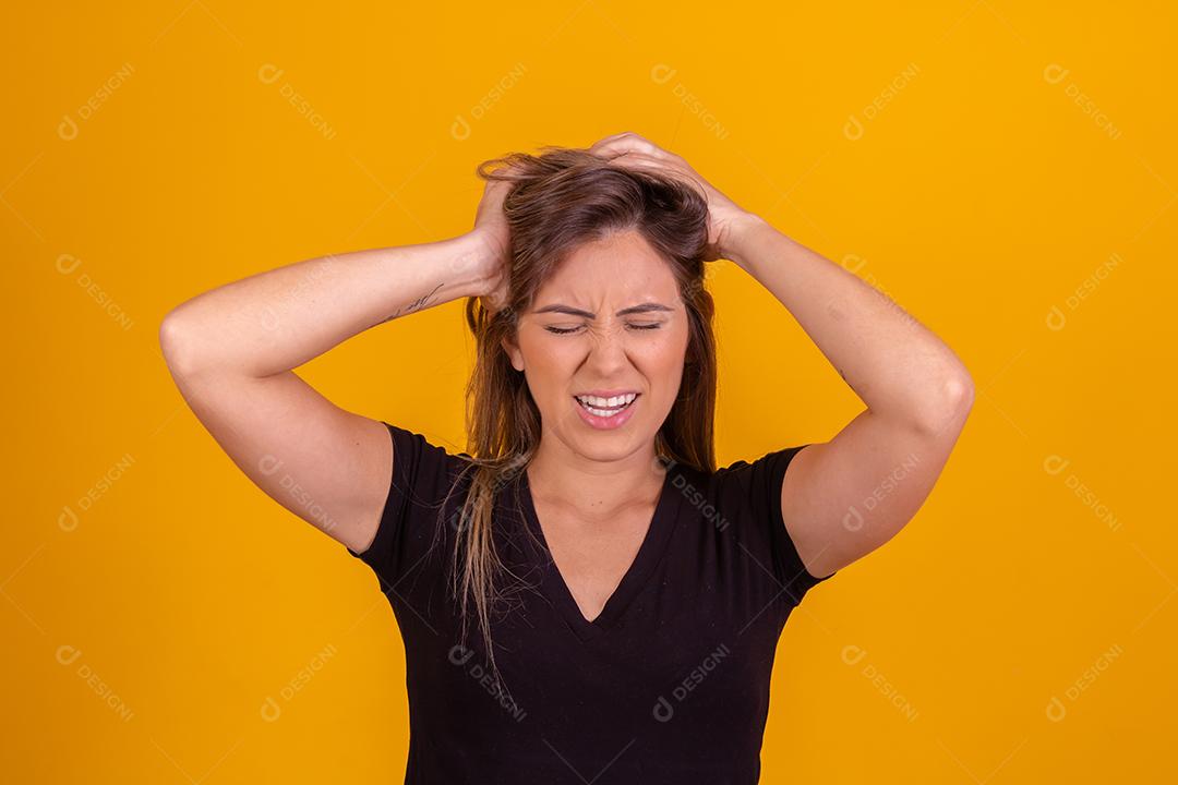 Blond woman in pain passing hands over her head