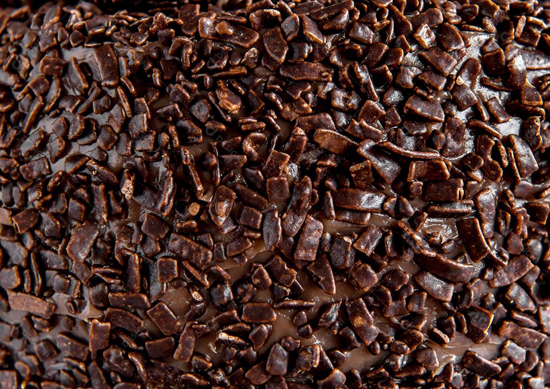 Fundo de textura de bolo de chocolate, fundo de grânulos de brigadeiro