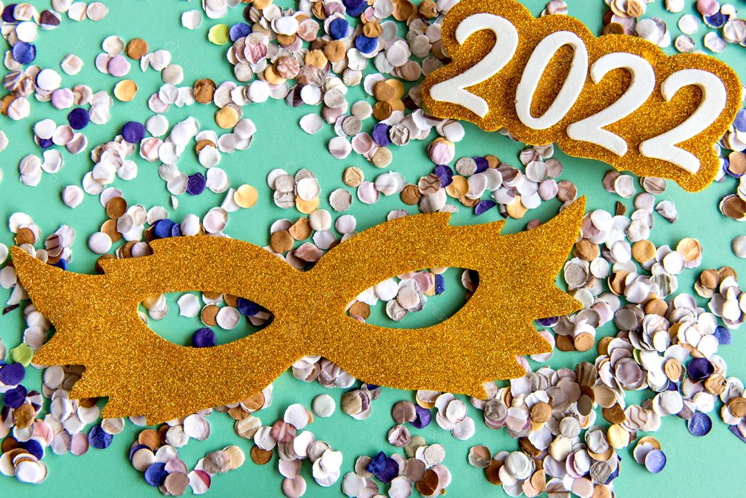 Golden Mask and Confetti 2022 on a Yellow Background Brazilian Carnival