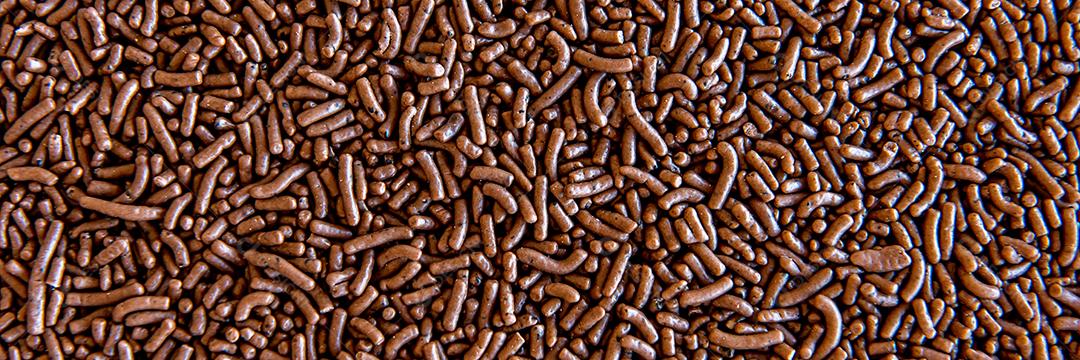 Chocolate granulado fundo de textura. Formato ao ar livre