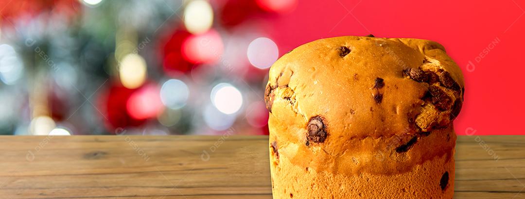 Panetone no fundo de natal Formato ao ar livre de sobremesa de natal
