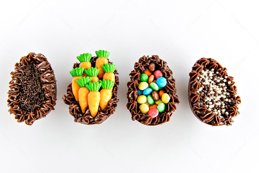 Easter eggs filled with chocolate on white background, brazilian