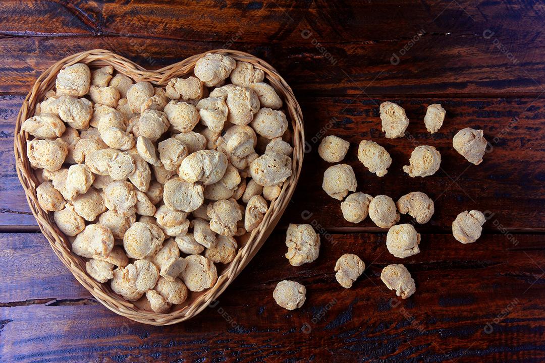 Soy meat pieces in a rustic pan. Top view of raw soybean chunks on rustic wooden background