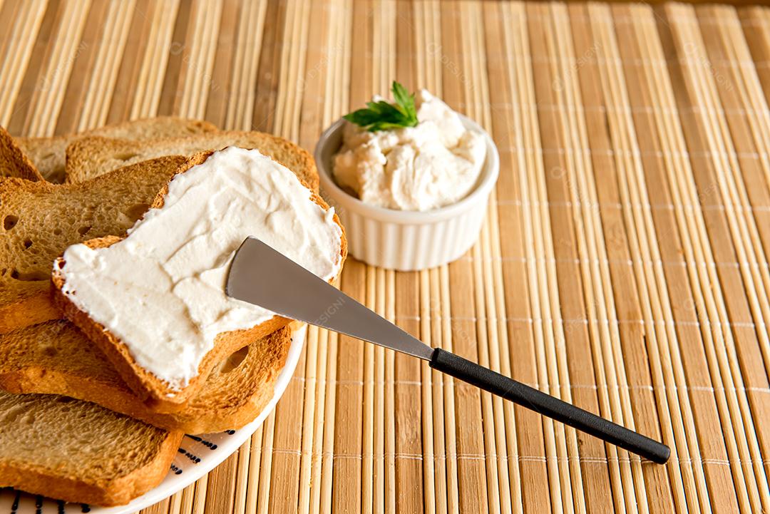 Toasted bread with ricotta cream on the breakfast table