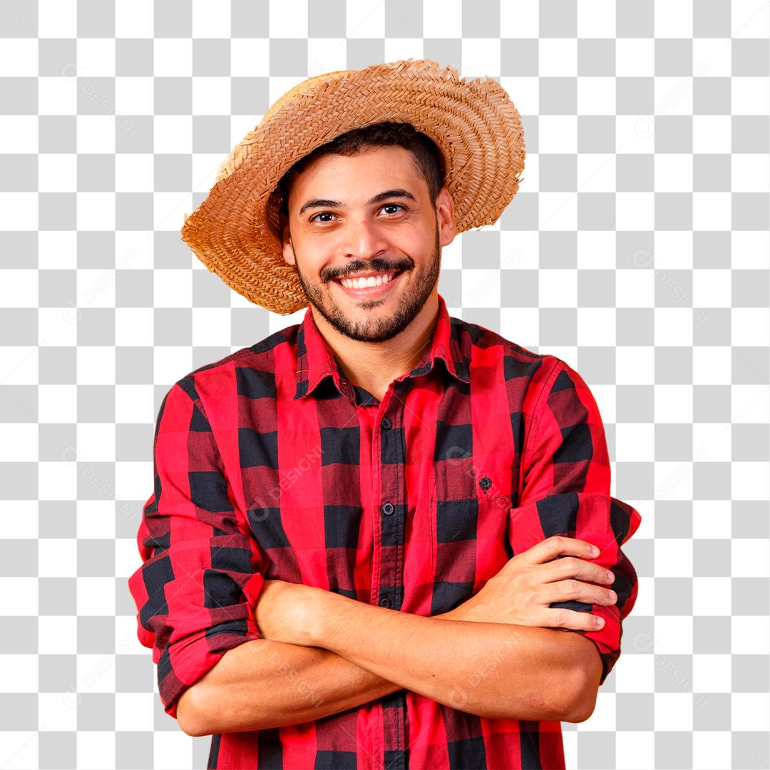 Homem com braços cruzados vestindo roupa típicas para Festas Juninas