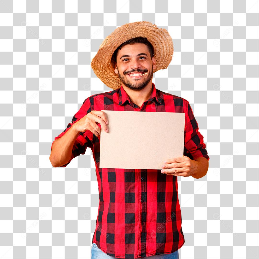 Homem brasileiro vestindo roupas típicas para a Festa Junina segurando placa