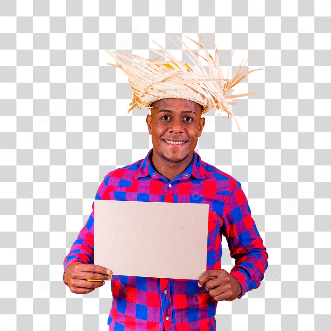 Jovem rapaz segurando placa de papel vestindo traje para festa junina