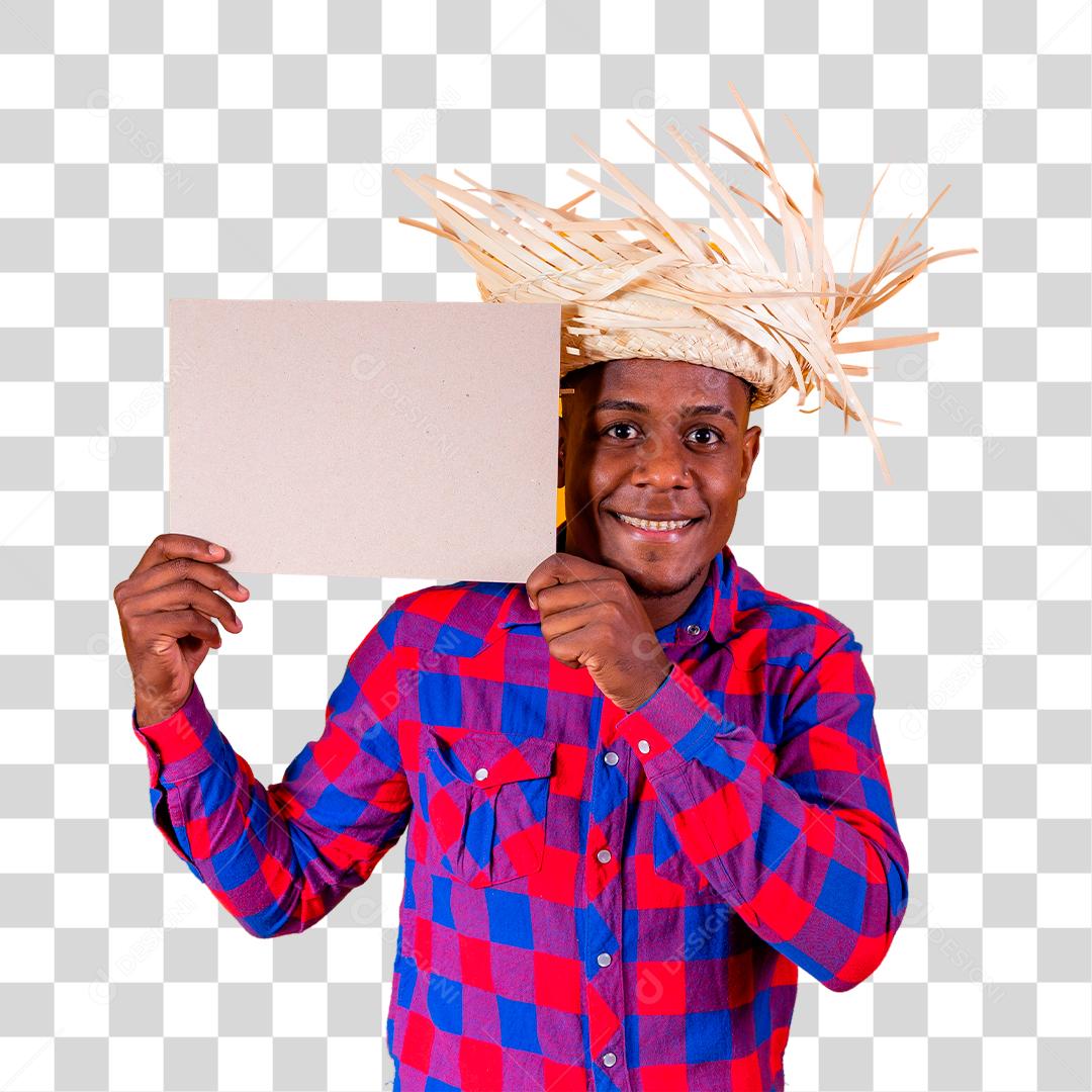 Jovem rapaz vestindo roupas para a Festa Junina e segurando placa São João