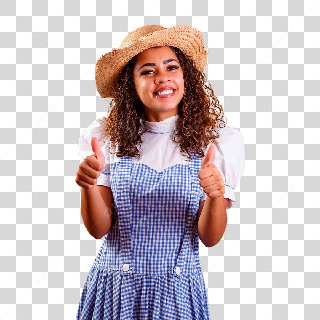 Mulher brasileira vestindo roupas típicas para a Festa Junina com os polegares para cima