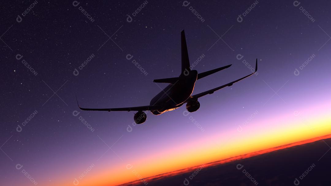 Avião comercial voando sobre o pôr do sol incrível