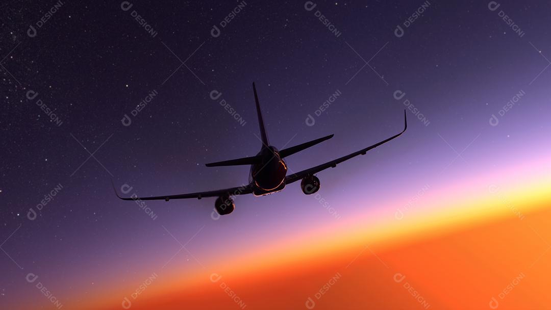 Avião comercial voando sobre o pôr do sol incrível