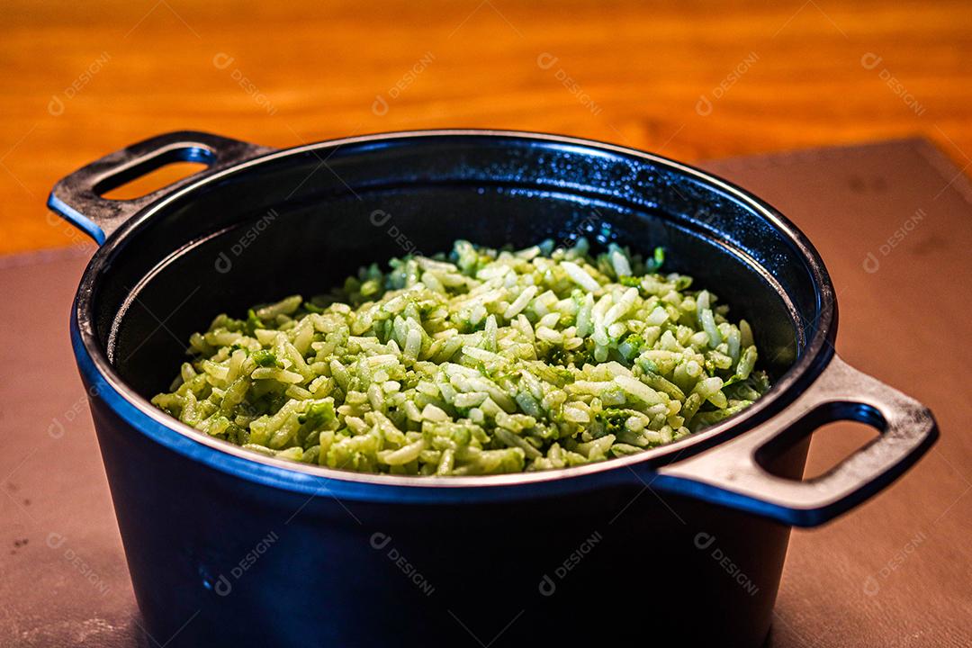 Green rice food pan above table