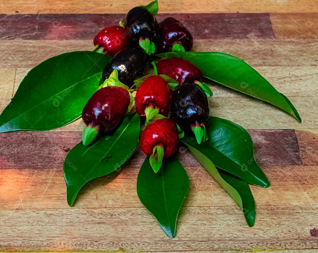 Cherry sapling fruit table wood leaf green twigs