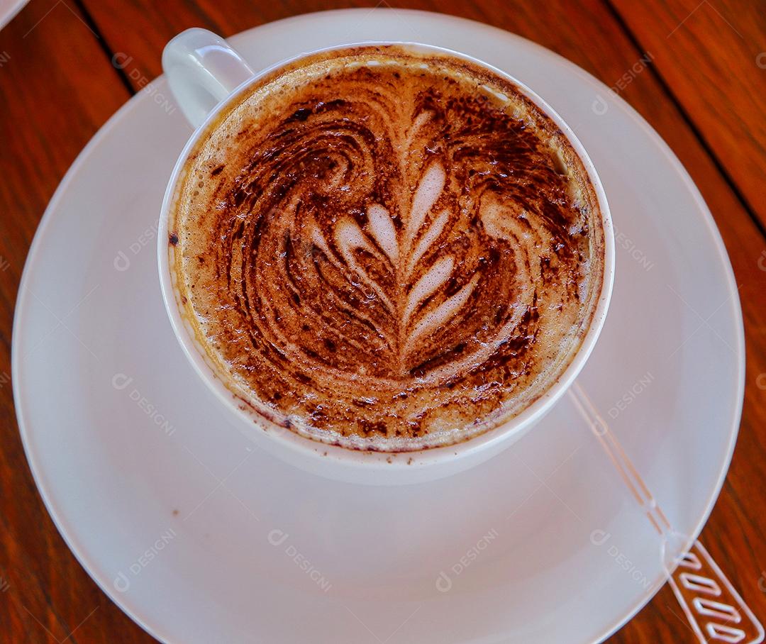 Café expresso sobre uma xicara padaria