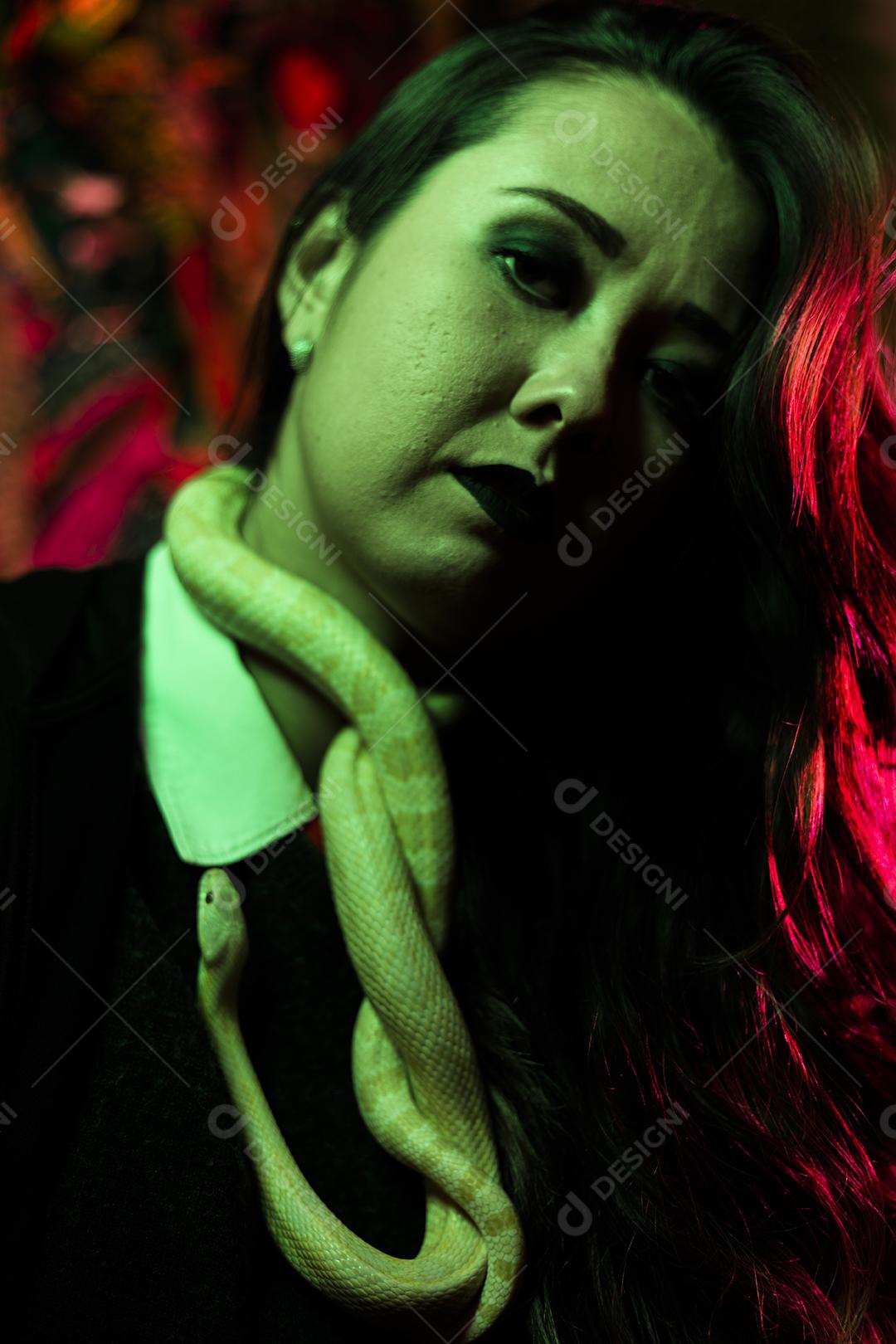Woman holding snake snake