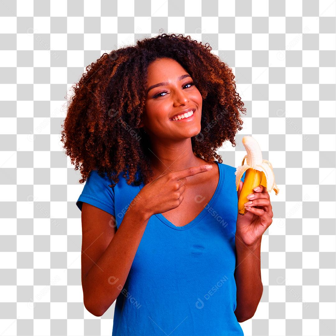 jovem afro comendo banana. Conceito de saúde. Alimentação saudável