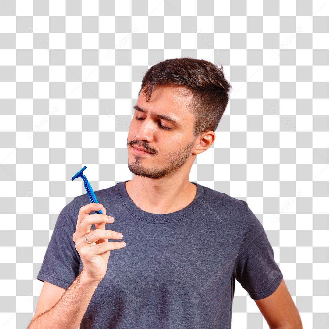 Homem Jovem segurando a lâmina de barbear