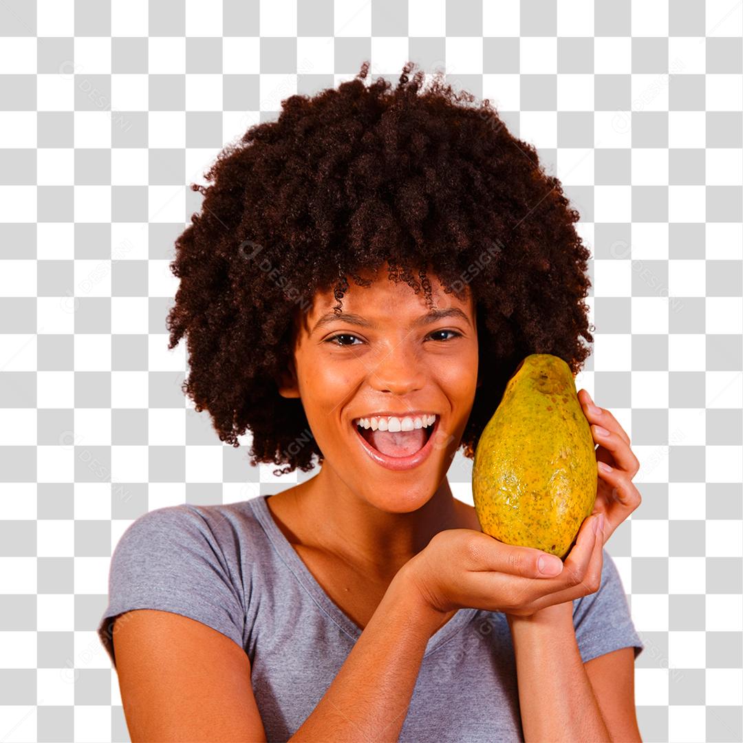 Jovem e bela mulher segurando mamão fruta