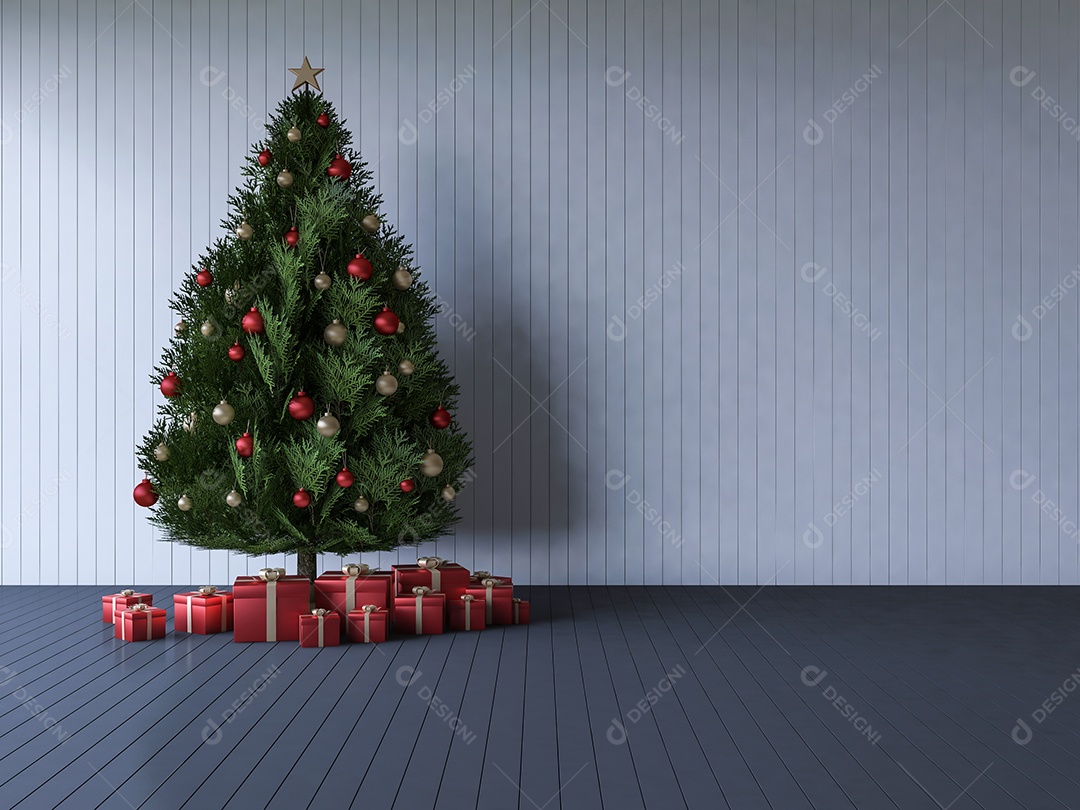 Arvore de natal decorada por bola dourada e vermelha e caixas de presente vermelhas atadas na sala que têm piso e parede de madeira.