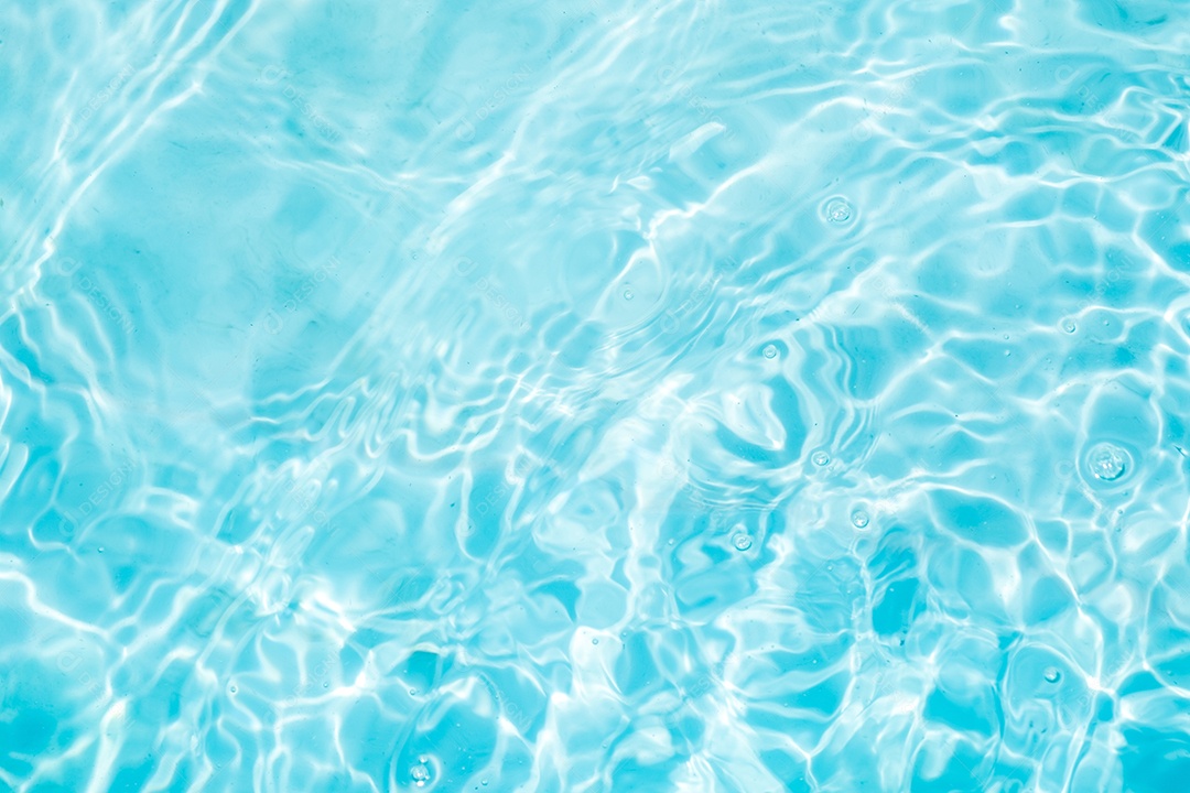 Blurred transparent blue color calm water surface texture with splashes and bubbles. Trendy abstract nature background. Water waves in sunlight. water background